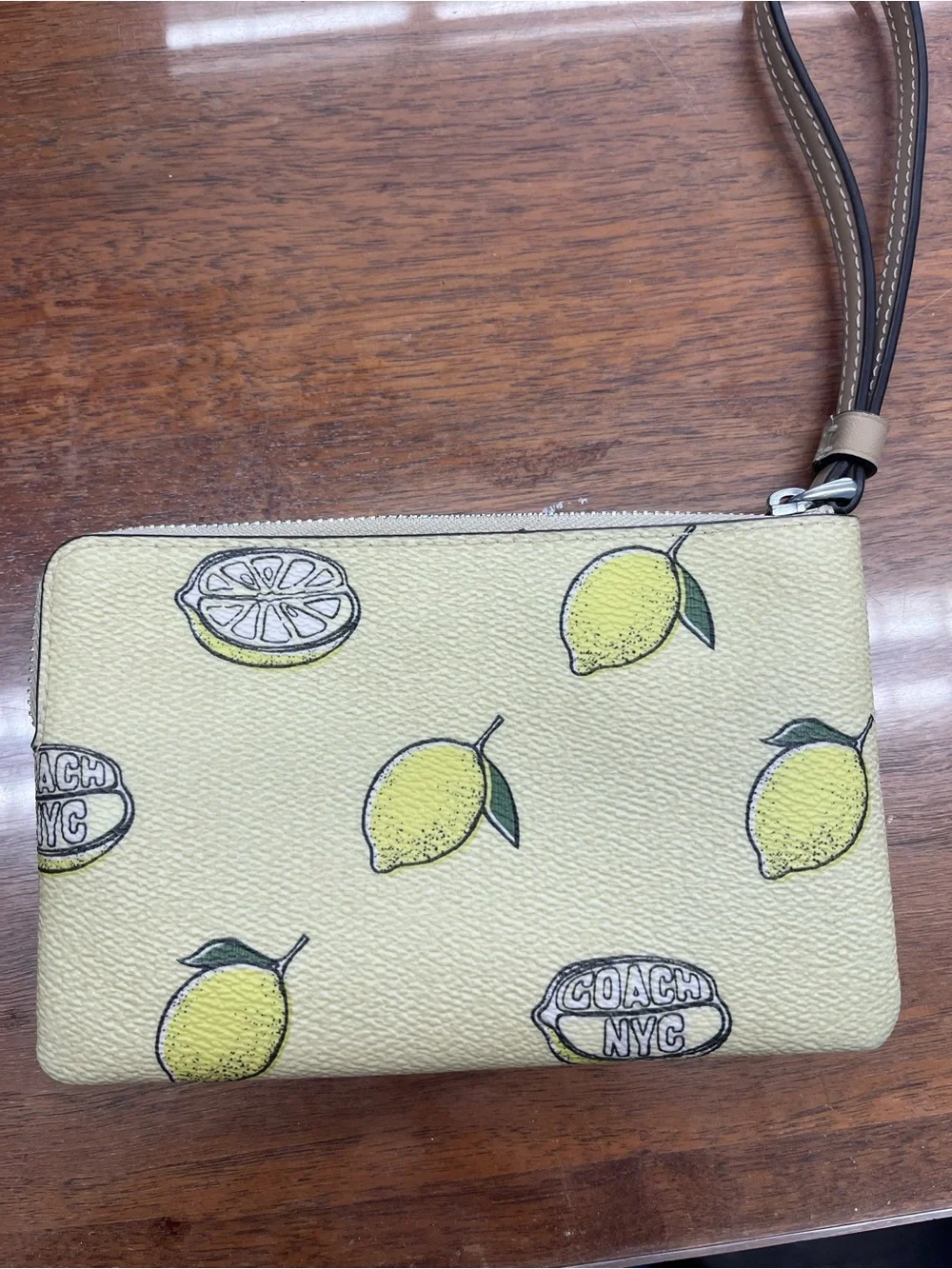 COACH Lemon Print Wristlet Pouch - Pale Yellow with Brown Strap